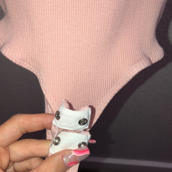 A pretty light pink one piece - Picture 3 of 5